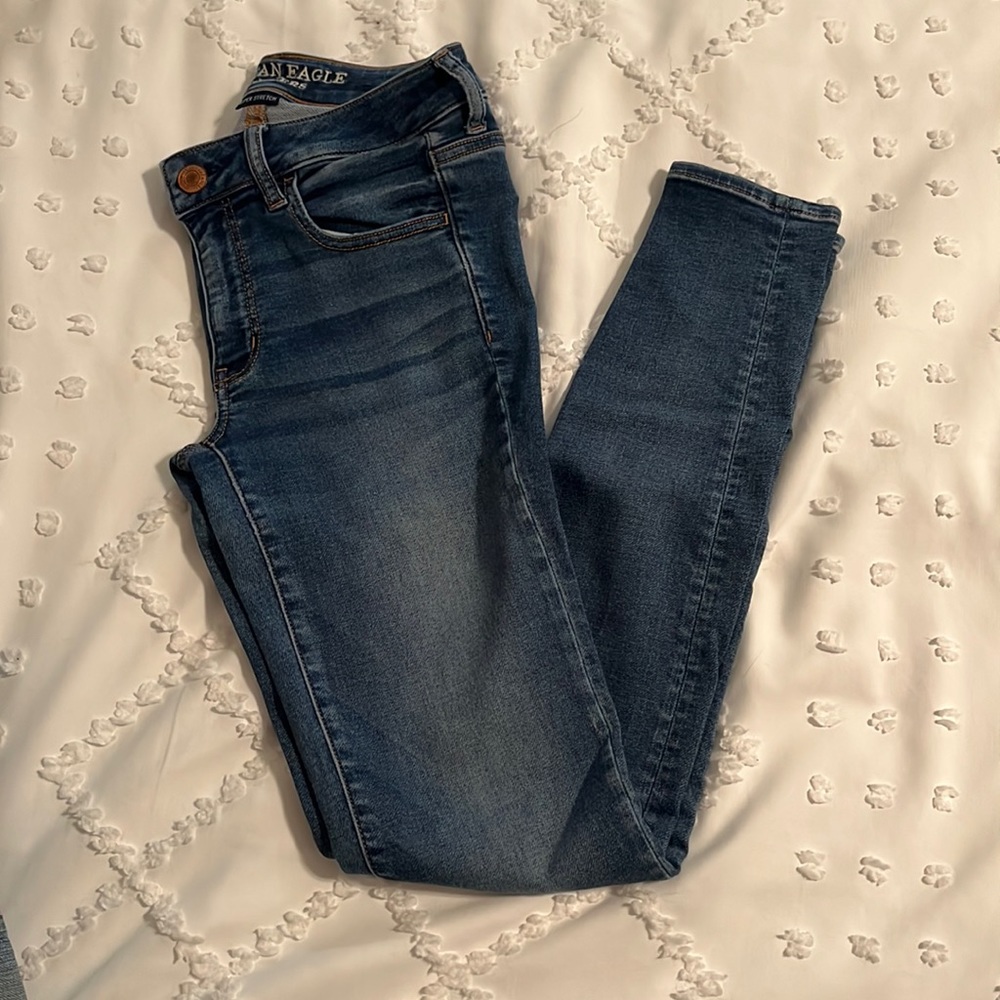 Mid rise medium wash super soft jeans